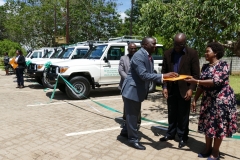 Mrs. Karen Sichinga handing over the White Books.