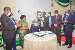 Hon. Sylvia Masebo, cuts cuts the cake to mark  ChAZ"s 50 years